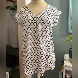 White and Blue Zip down short sleeved blouse